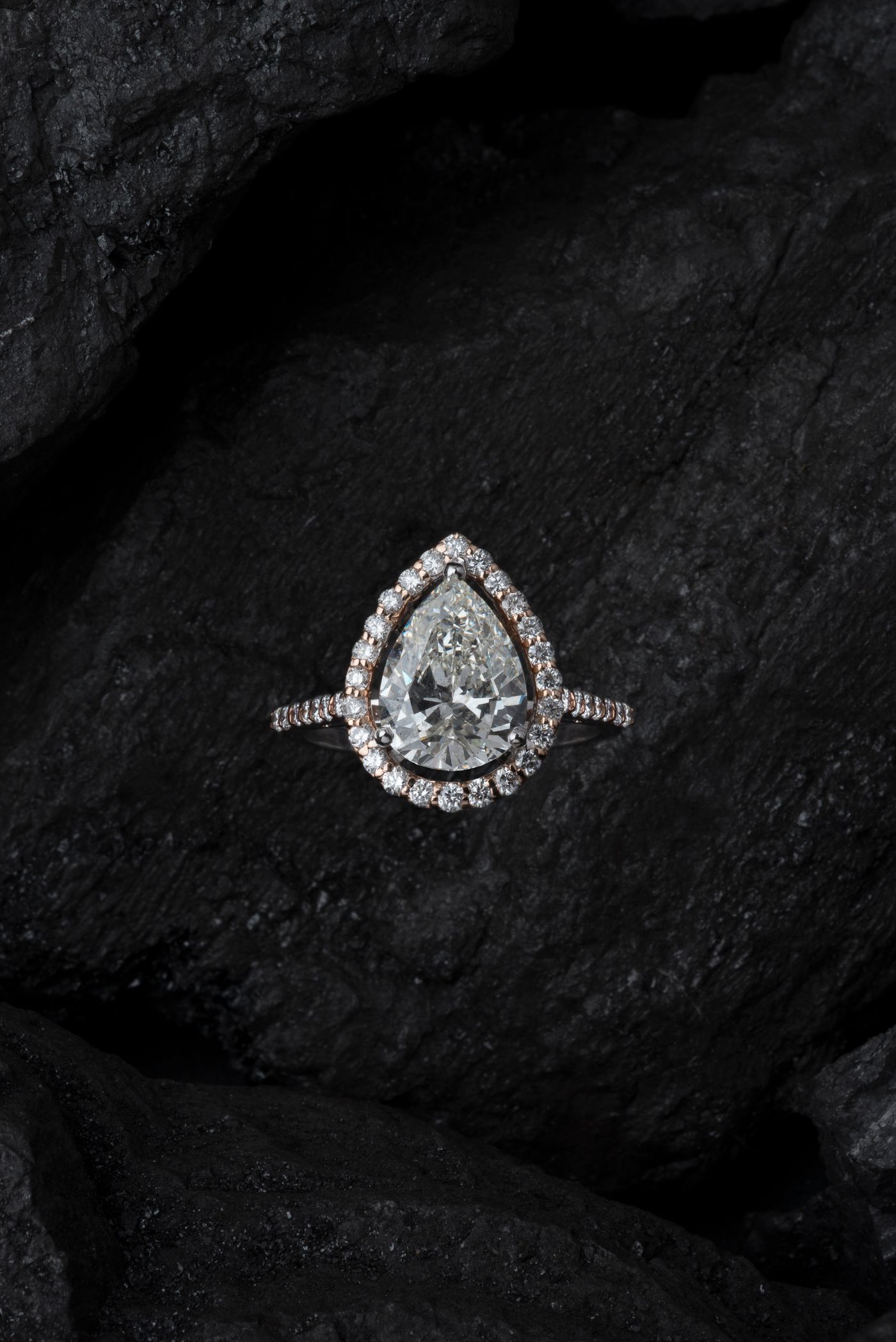 A pear-cut halo ring
